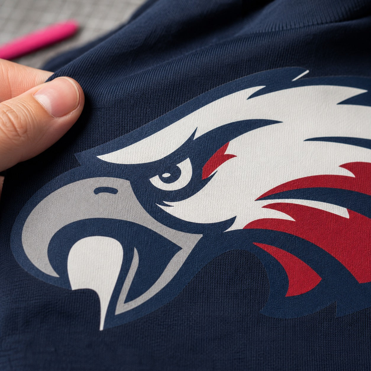 Custom school spirit shirts printed in white and blue by Rolled Up Printing